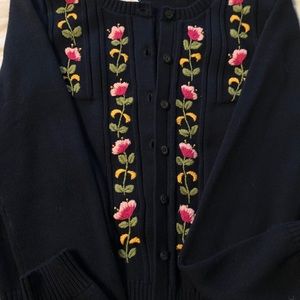 Cardigan Sweater with floral embroidery.
